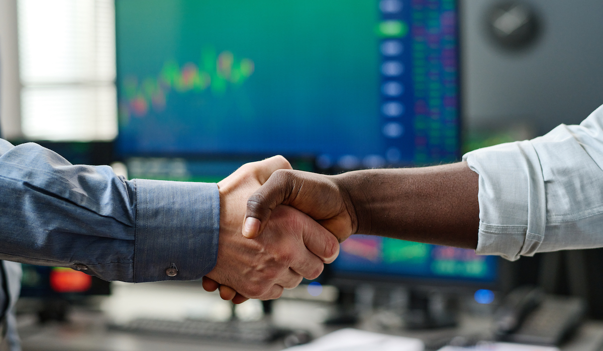 business-partners-doing-handshake-1200x700
