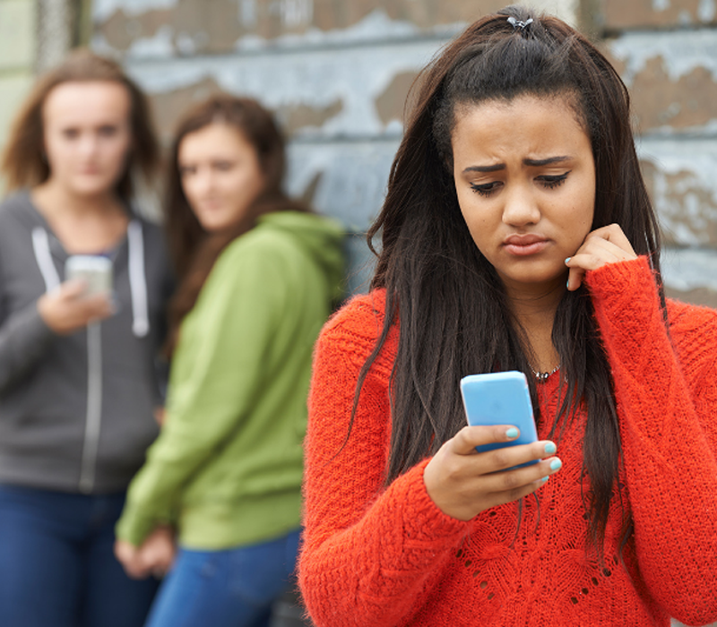 sad girl being bullied