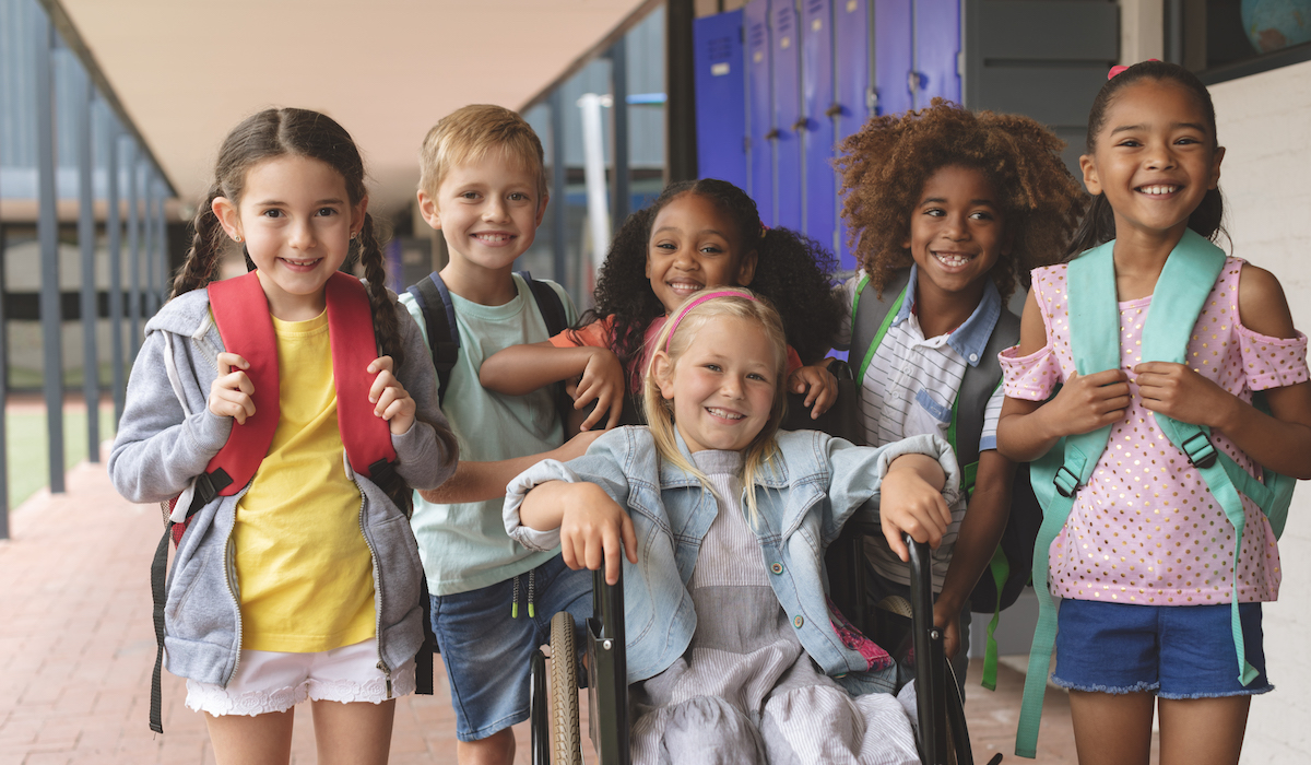 school-kids-standing-in-outside-corridor-at-school-2021-08-28-16-45-31-utc