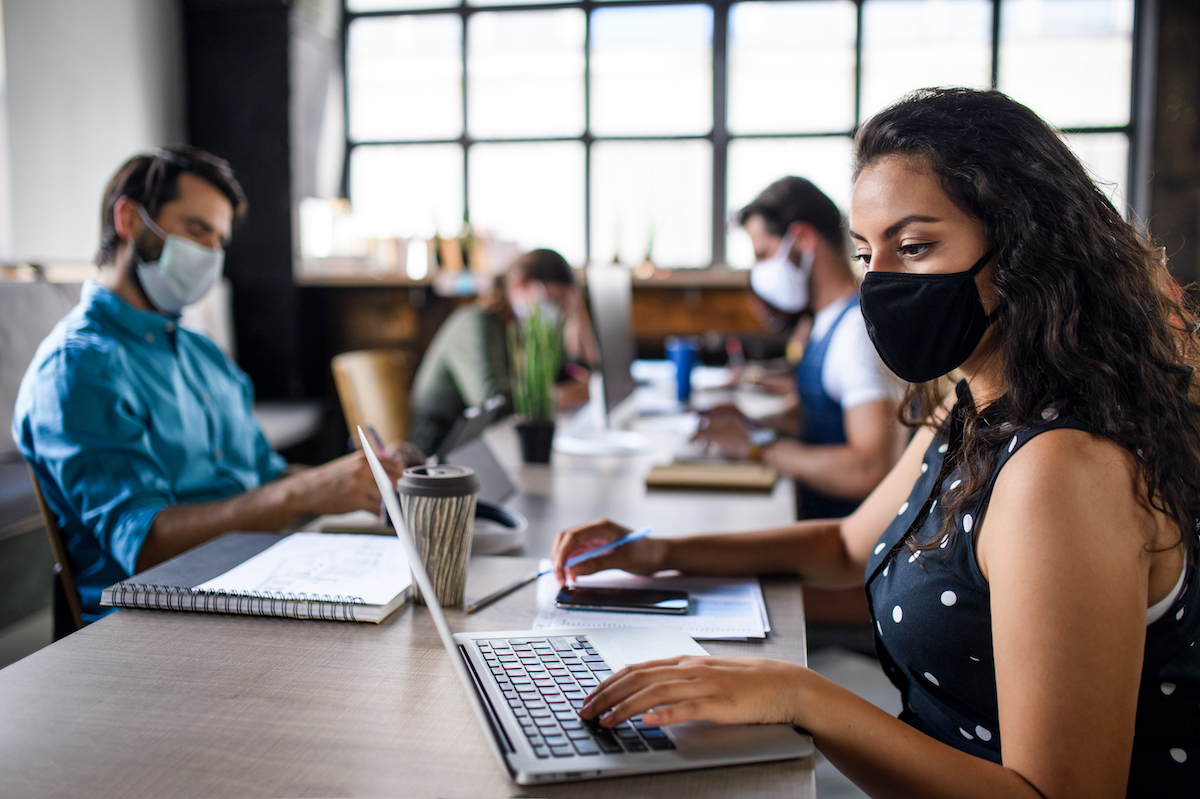 business people with face masks