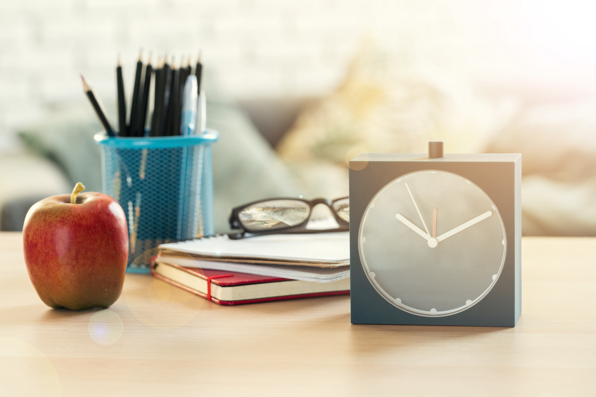 clock on a teachers desk