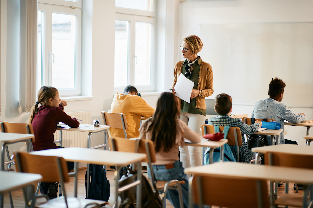 teacher observing her class