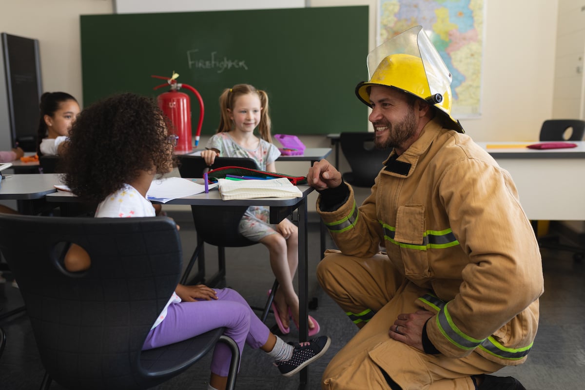 firefighter teaching students
