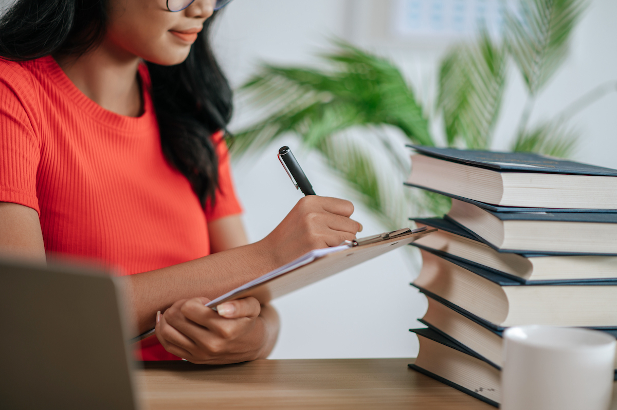 woman holding a checklist