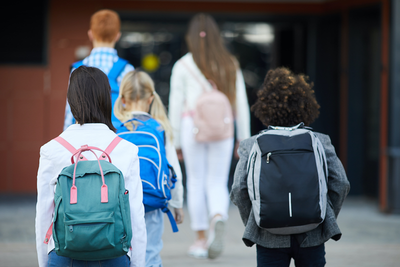 kids walking back in to school